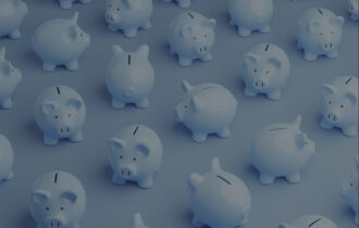 An array of blue piggy banks on a blue background